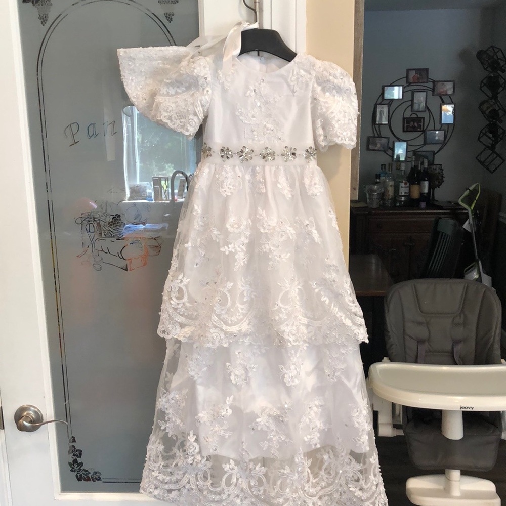 Christening gown new without tags. Never worn